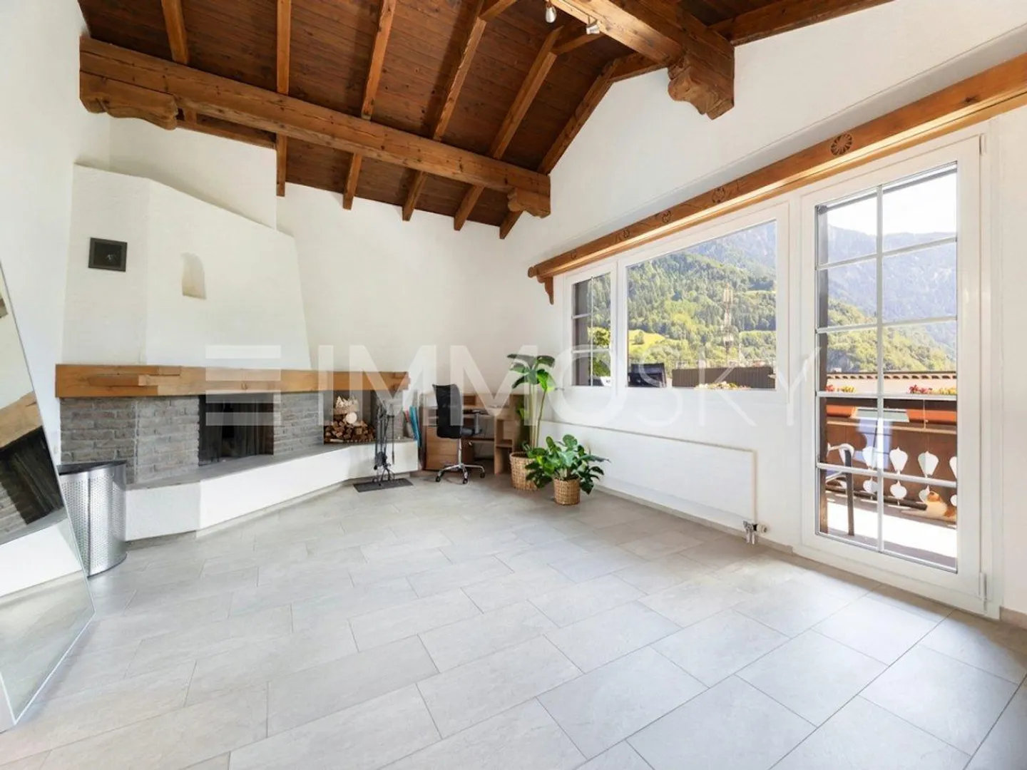 Light-Filled Living with Fireplace and Comfort - Photo 1 of 5