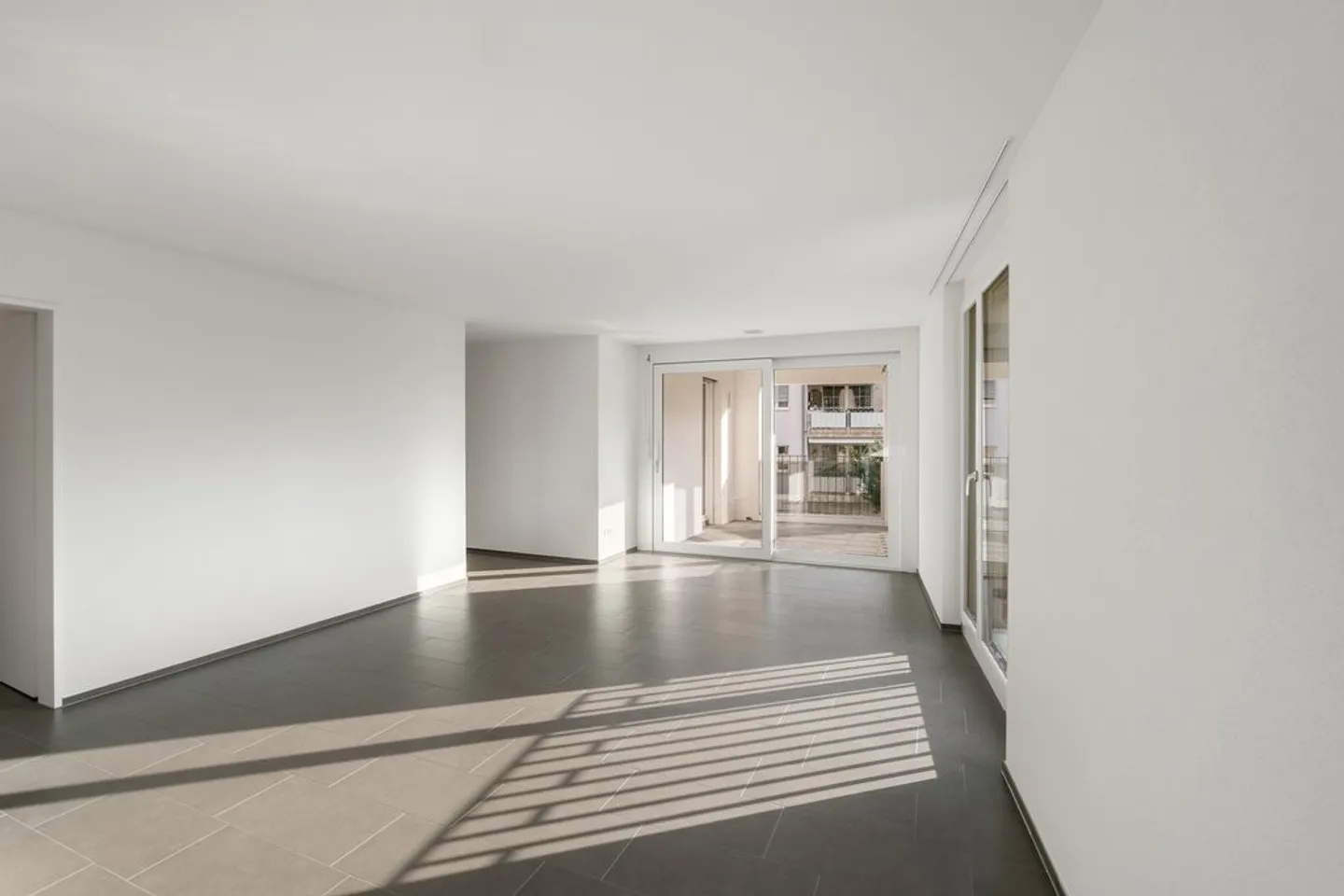 Appartement 3.5 pièces - Foto 2 von 11