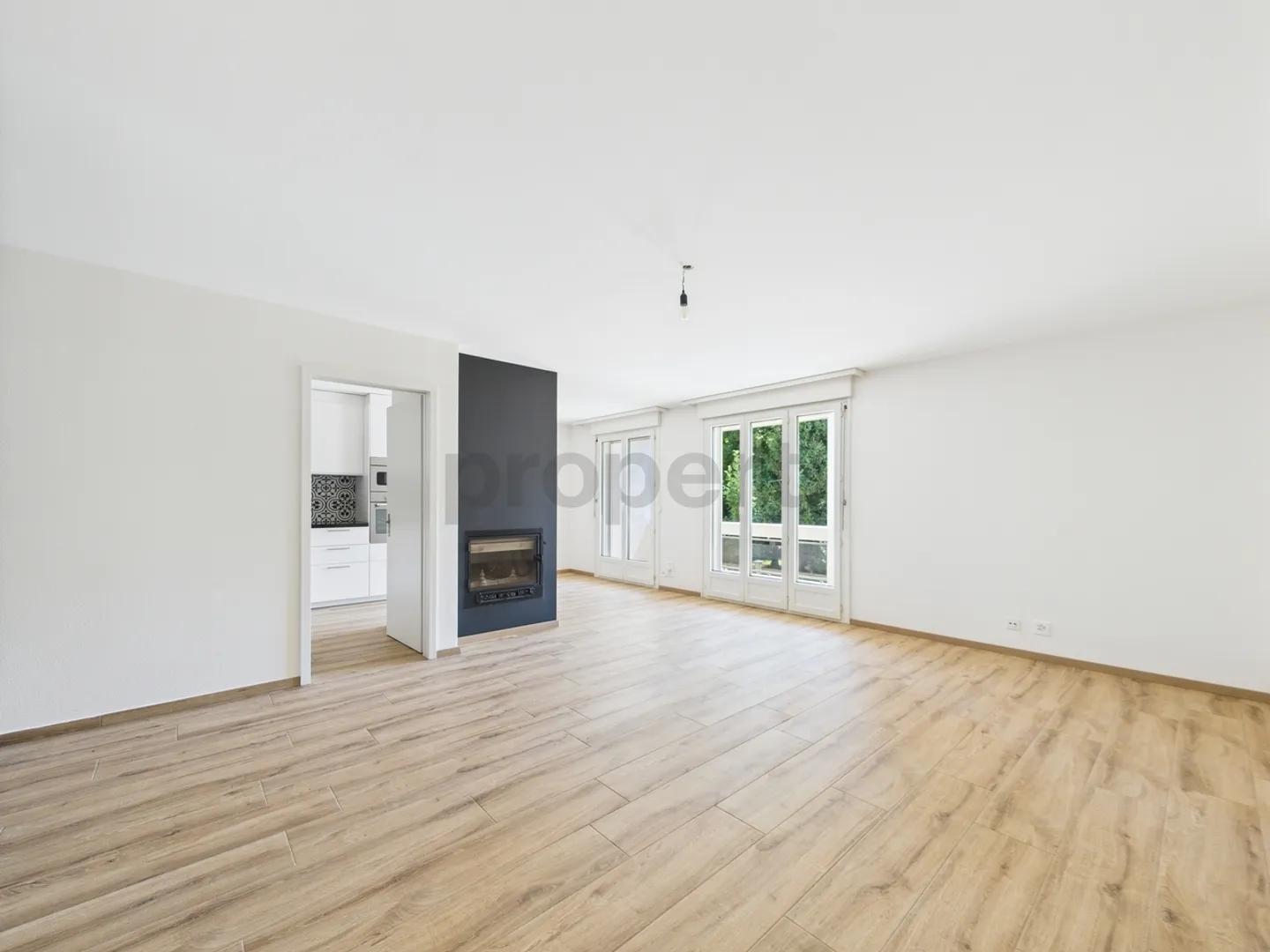 3,5 Zimmer vollständig renoviert mit Garage, Balkon und Kamin - Foto 1 von 10