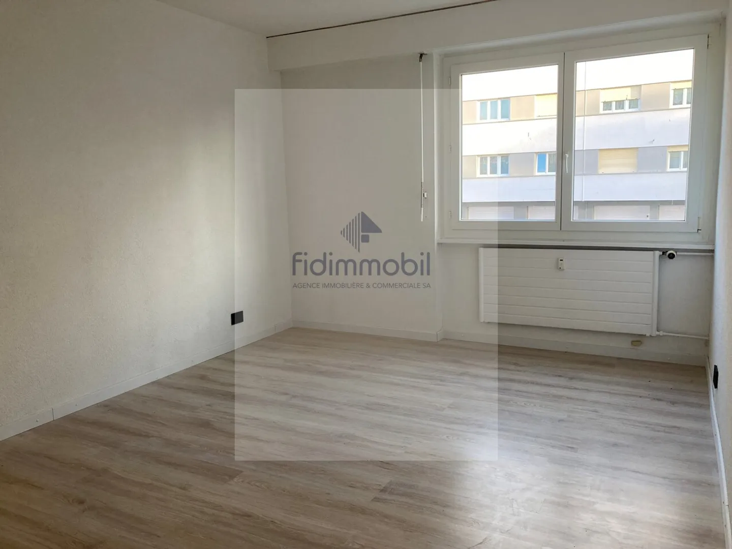 Appartement rénové 3,5 pièces - Photo 6 sur 7