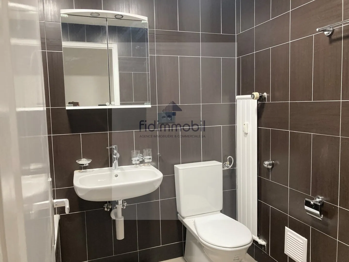 Appartement rénové 3,5 pièces - Photo 7 sur 7