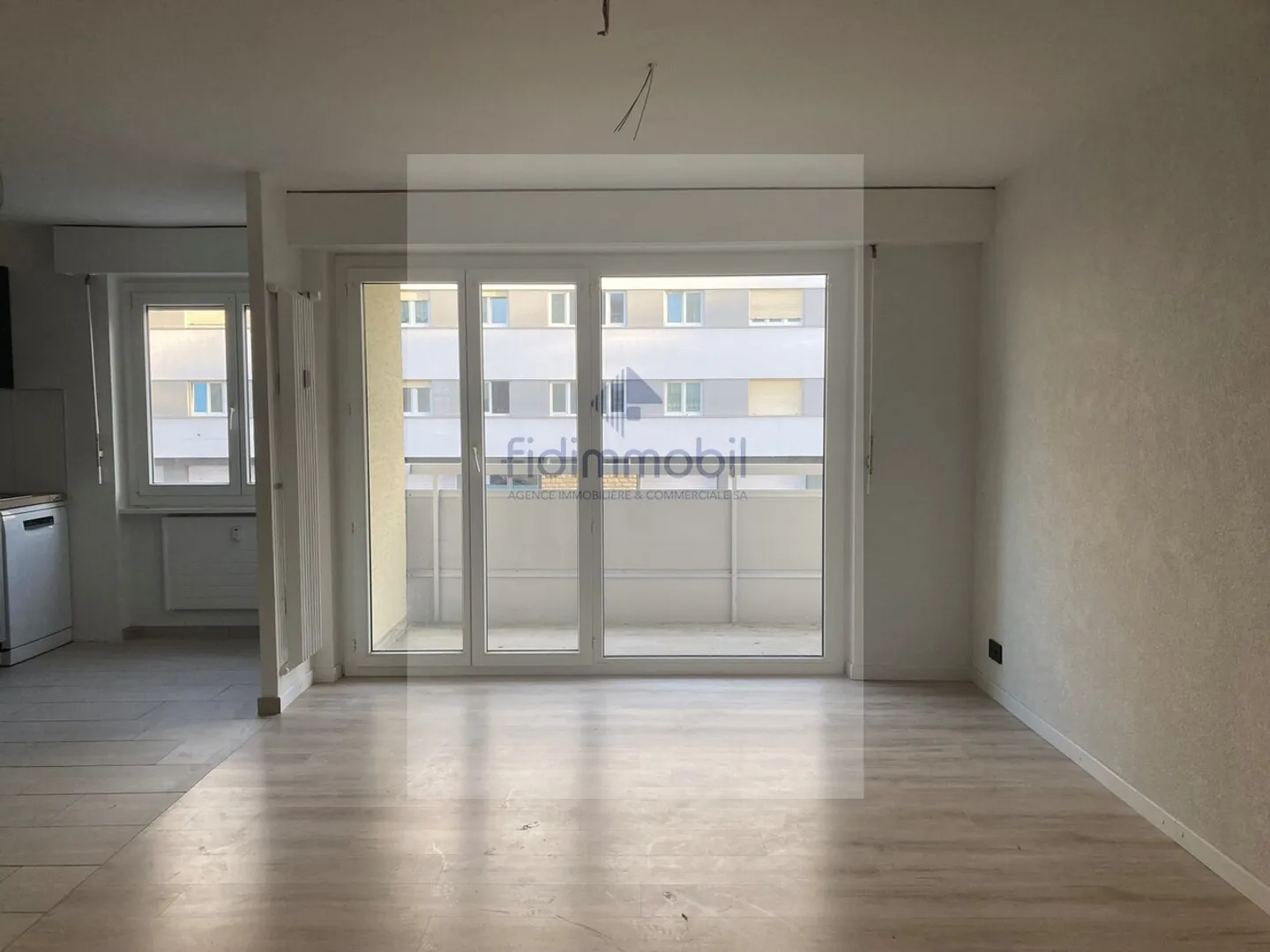 Appartement rénové 3,5 pièces - Photo 3 sur 7