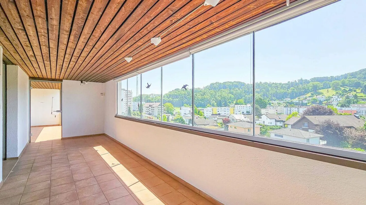 Geräumige Dachwohnung mit Wintergarten - Foto 13 von 27