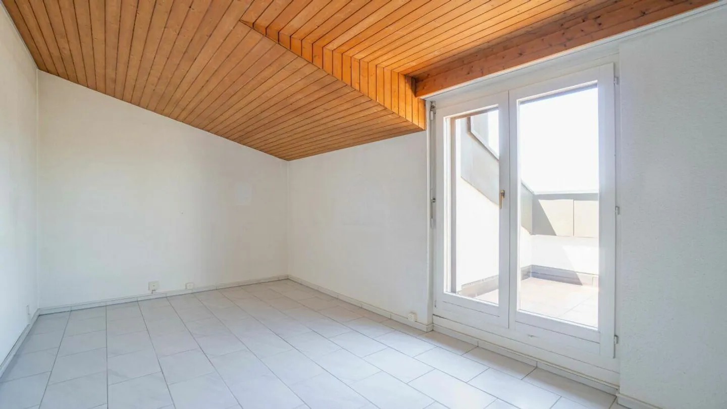 Geräumige Dachwohnung mit Wintergarten - Foto 20 von 27