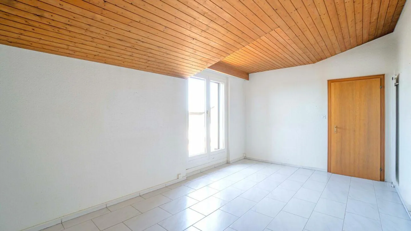 Geräumige Dachwohnung mit Wintergarten - Foto 21 von 27