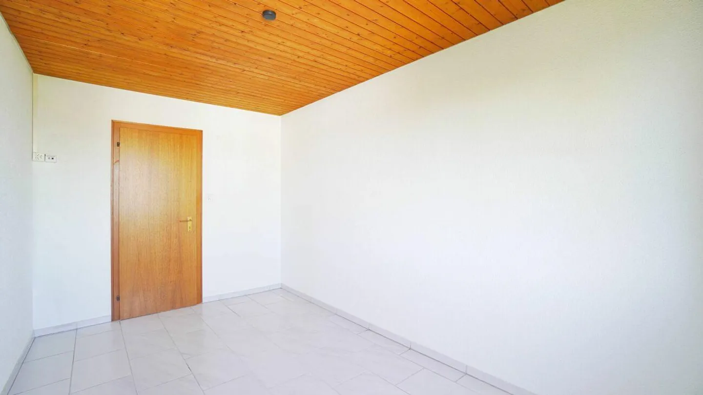 Geräumige Dachwohnung mit Wintergarten - Foto 24 von 27