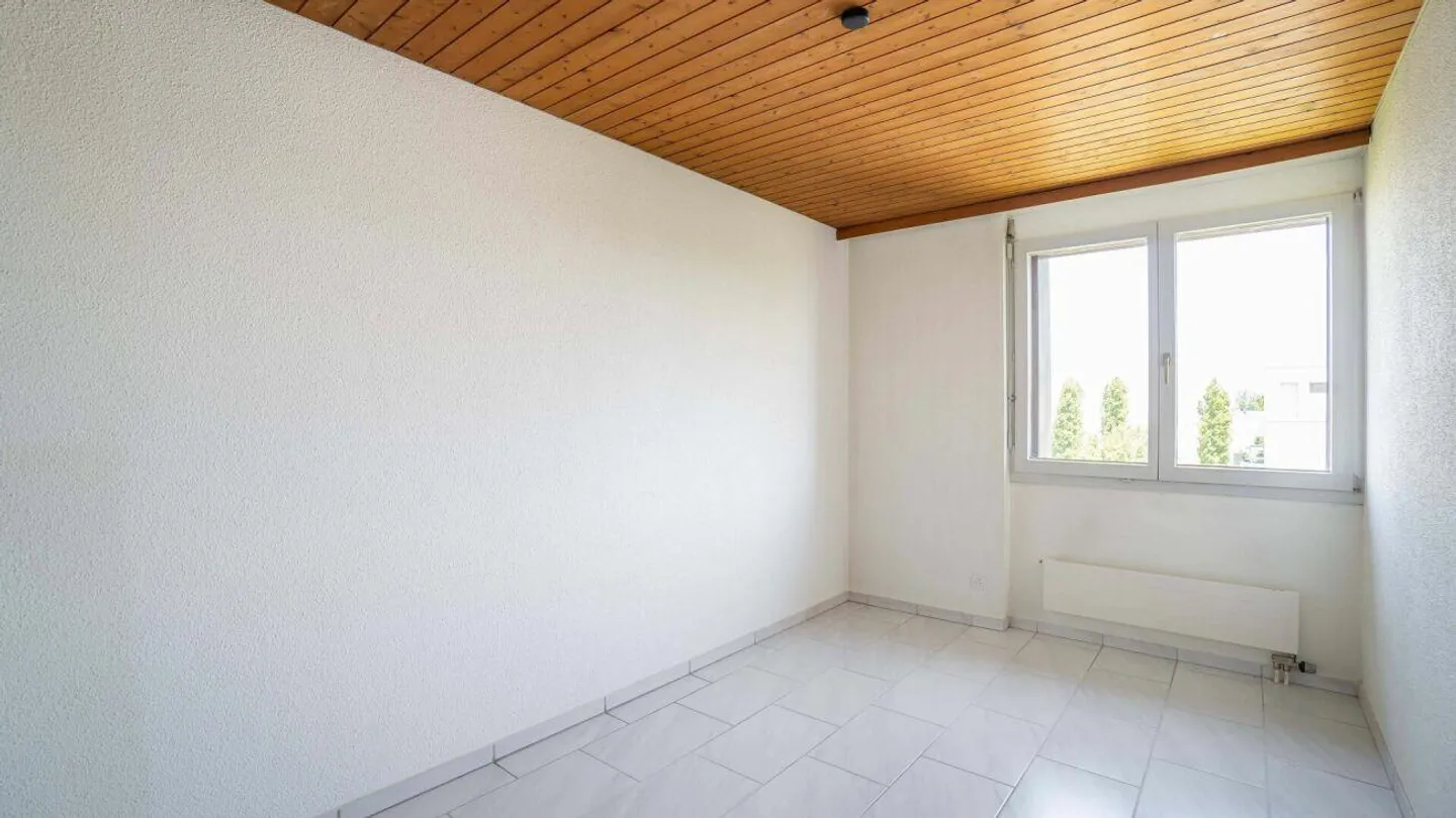 Geräumige Dachwohnung mit Wintergarten - Foto 26 von 27