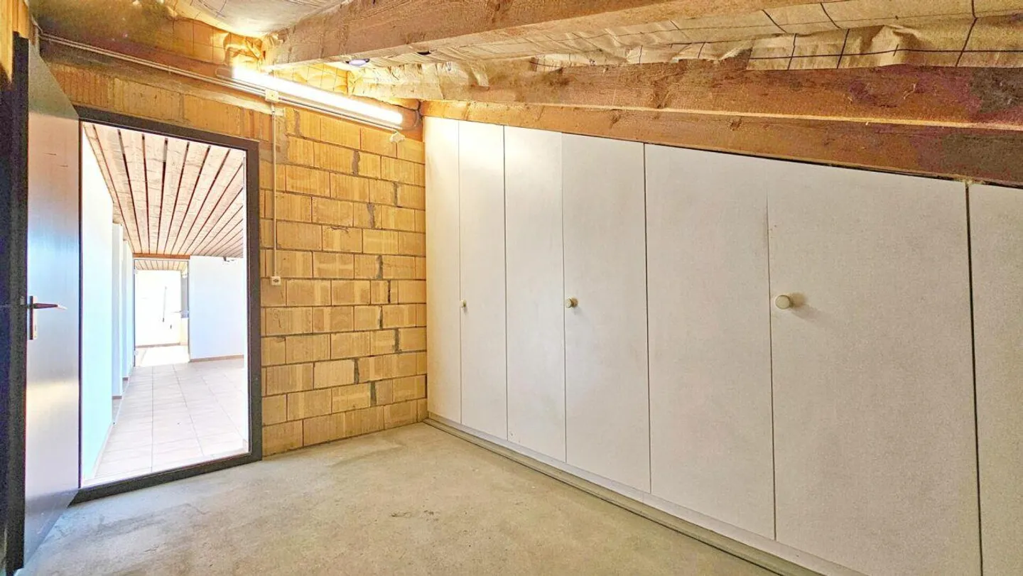 Geräumige Dachwohnung mit Wintergarten - Foto 27 von 27