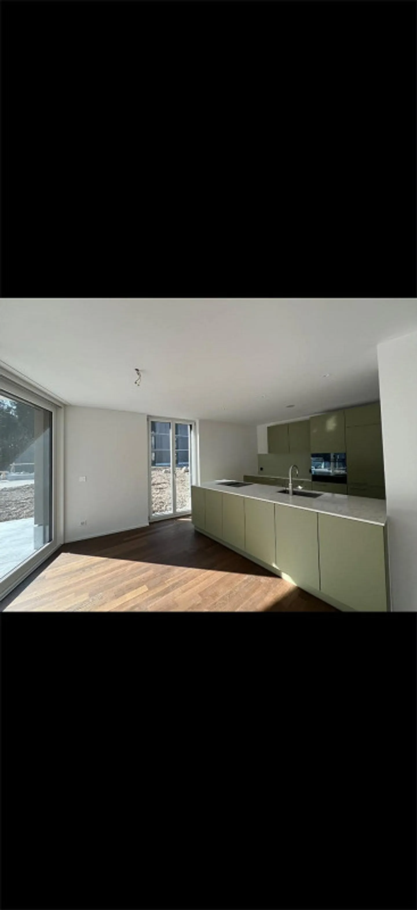 Appartement moderne de 3,5 pièces au rez-de-chaussée - Photo 3 sur 8
