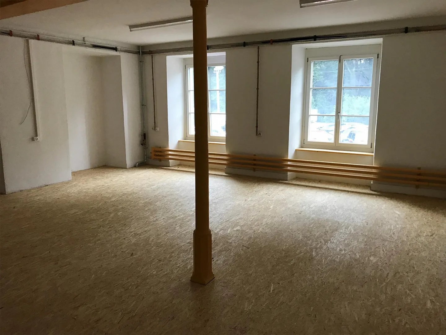 Espace commercial de 65m2 dans le développement commercial Seidenfabrik à sous-louer - Photo 3 sur 5