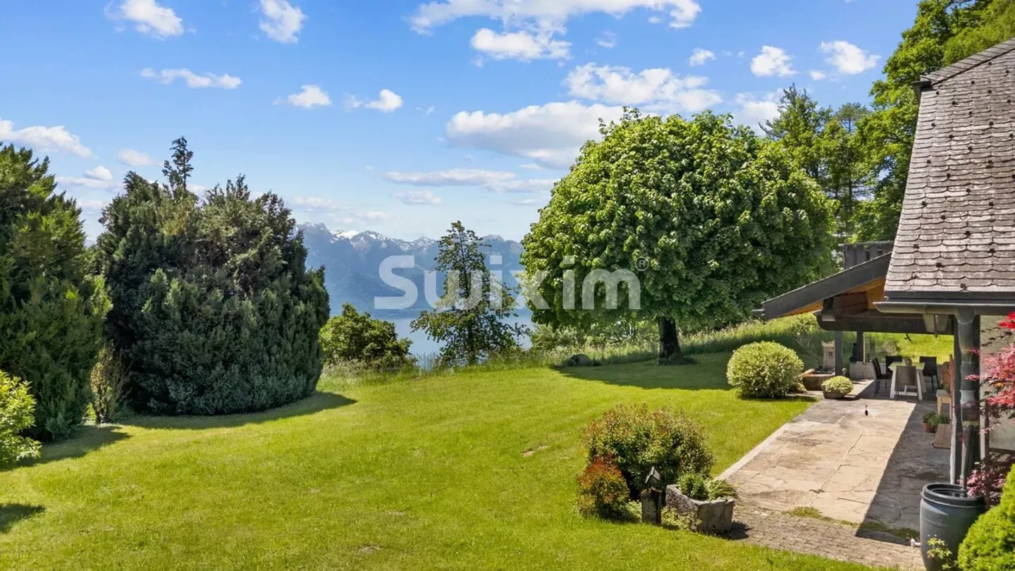 Maison Charmante avec Vue sur le Lac - Photo 9 sur 9