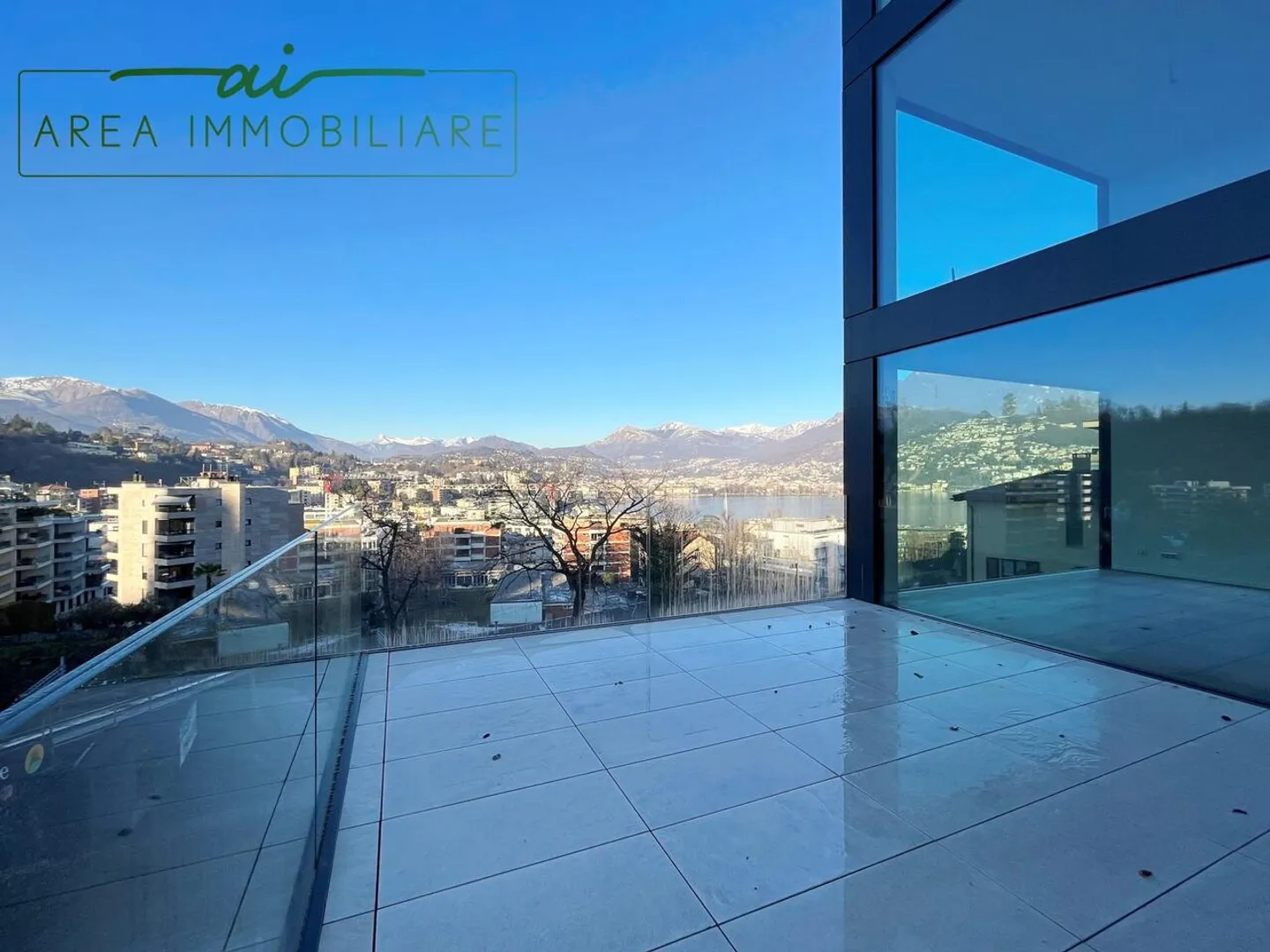 NEW 4.5-ROOM PENTHOUSE WITH LAKE VIEW IN PARADISO - Photo 2 of 13