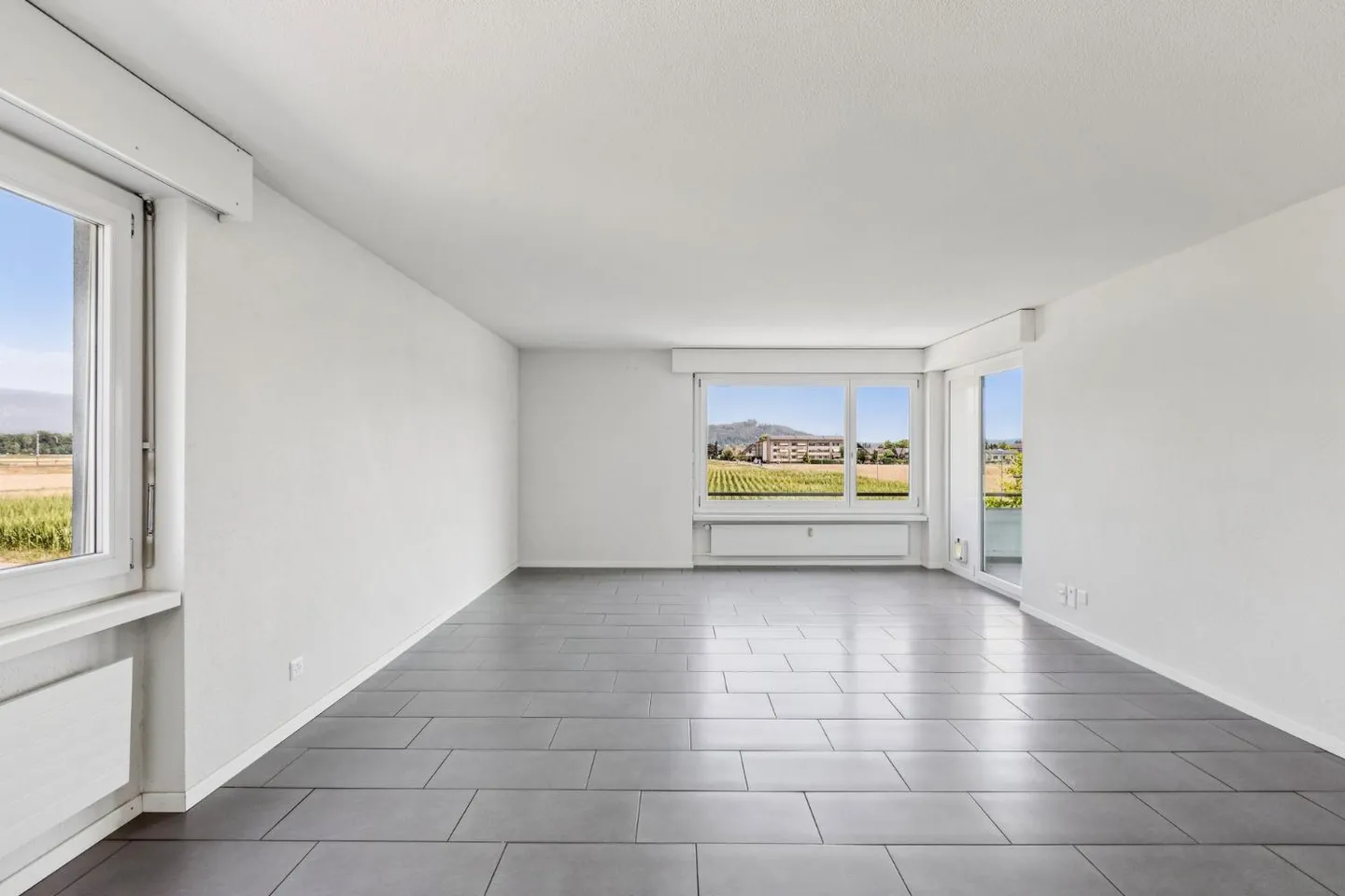 Appartement 4.5 pièces entièrement rénové avec balcon spacieux et vue... - Photo 1 sur 7