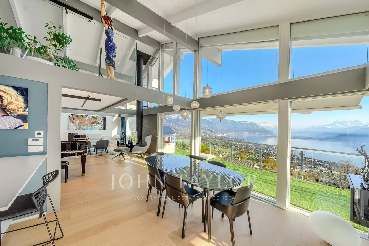 EXCLUSIVITY: Modern Villa with Panoramic Lake and Alpine Views - Photo 1 of 11