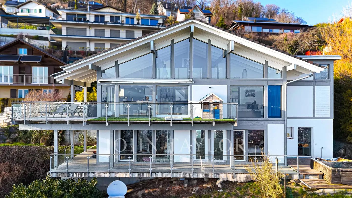 EXCLUSIVITY: Modern Villa with Panoramic Lake and Alpine Views - Photo 10 of 11