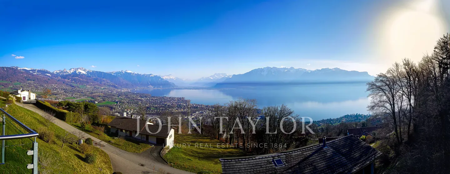 EXCLUSIVITY: Modern Villa with Panoramic Lake and Alpine Views - Photo 11 of 11