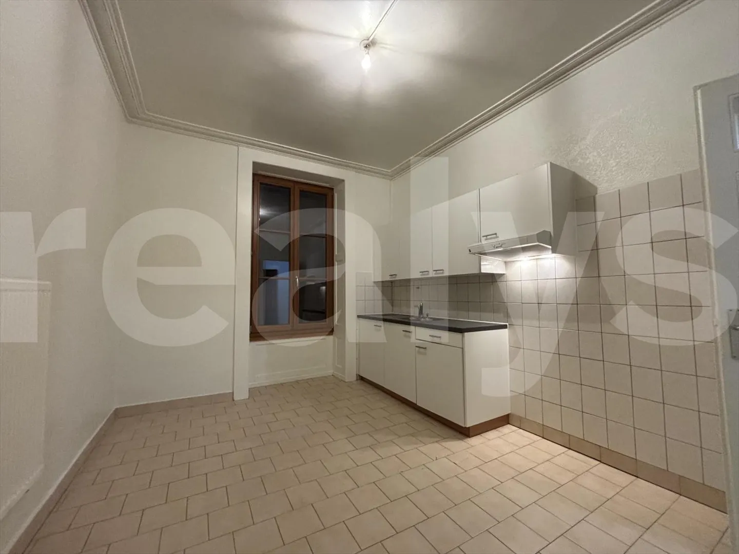 Appartement 3 pièces - Photo 2 sur 7