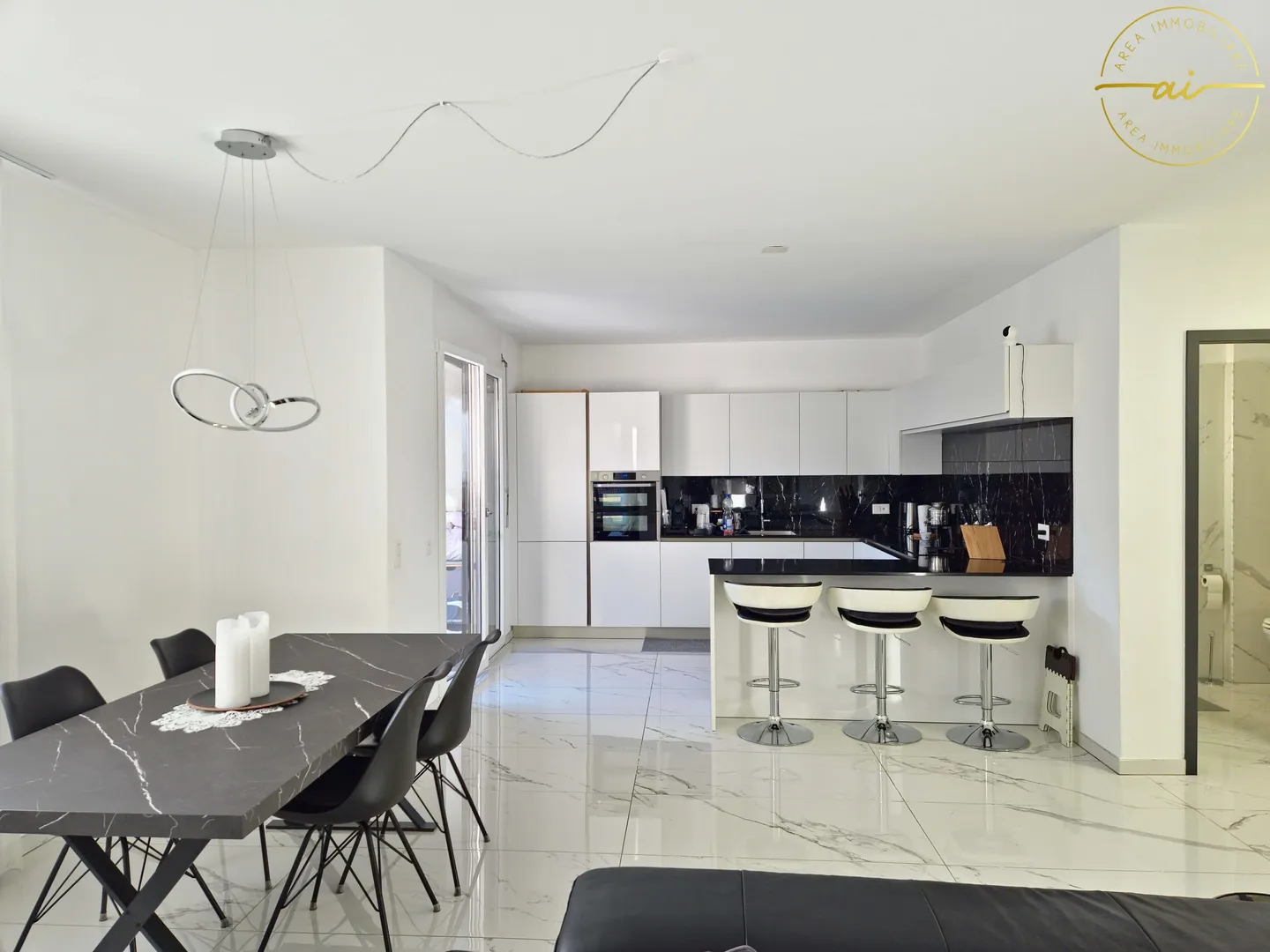 Appartamento elegante e luminoso di 4,5 locali con giardino privato a Viganello - Foto 1 di 13