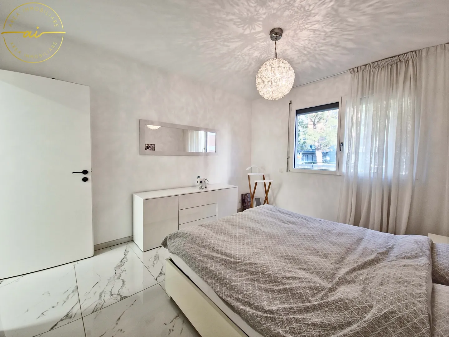 Appartamento elegante e luminoso di 4,5 locali con giardino privato a Viganello - Foto 11 di 13