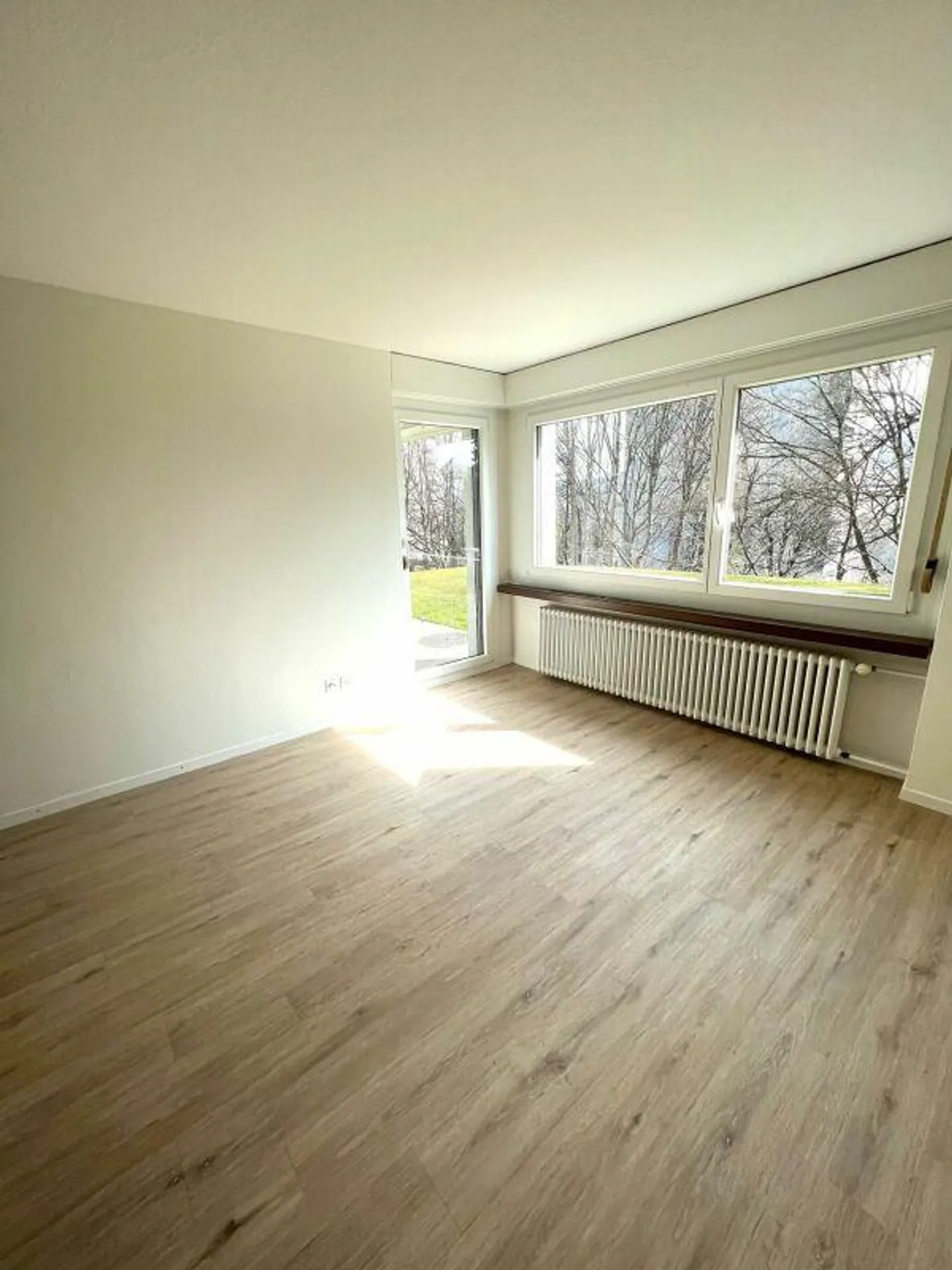 Charmante Wohnung mit Garten - Foto 4 von 8