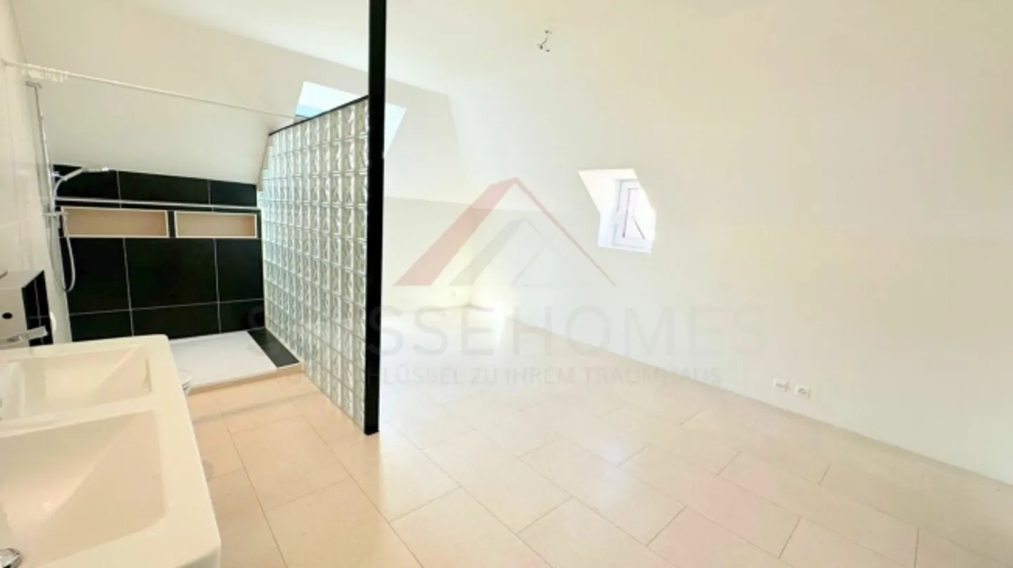 Renovated duplex of 200 m² on the top floor of a master house - comfort and charm in La Chaux-de-Fonds - Photo 10 of 14
