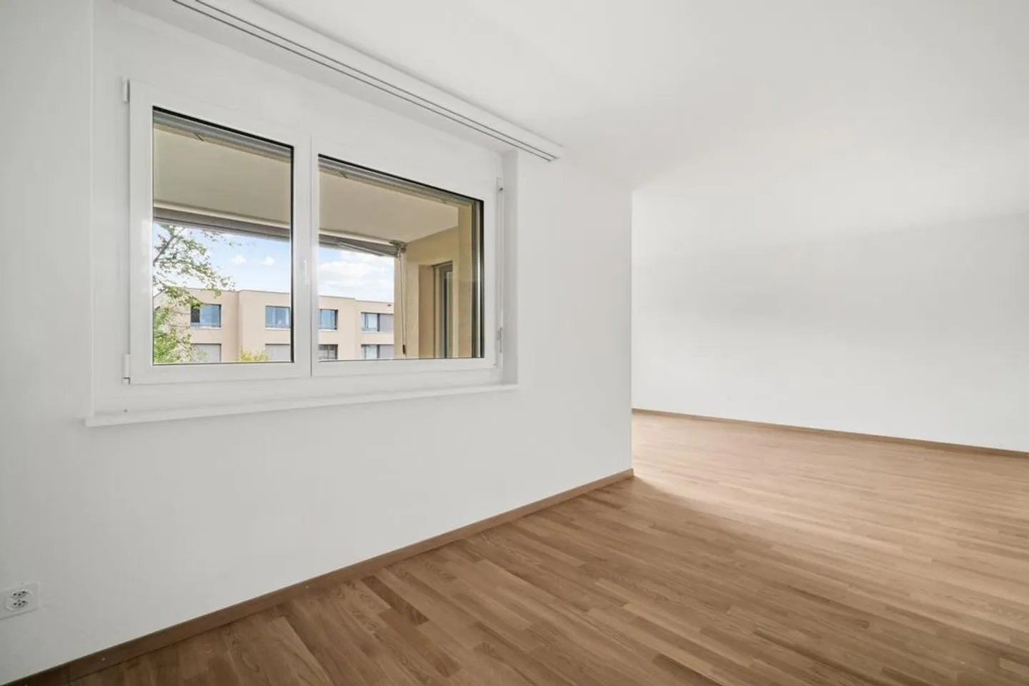 Appartement 4.5 pièces dans un quartier familial - Photo 3 sur 11