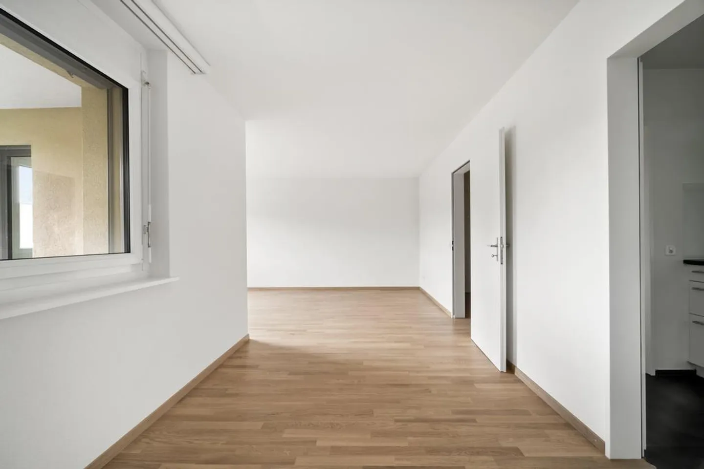 Appartement 4.5 pièces dans un quartier familial - Photo 4 sur 11