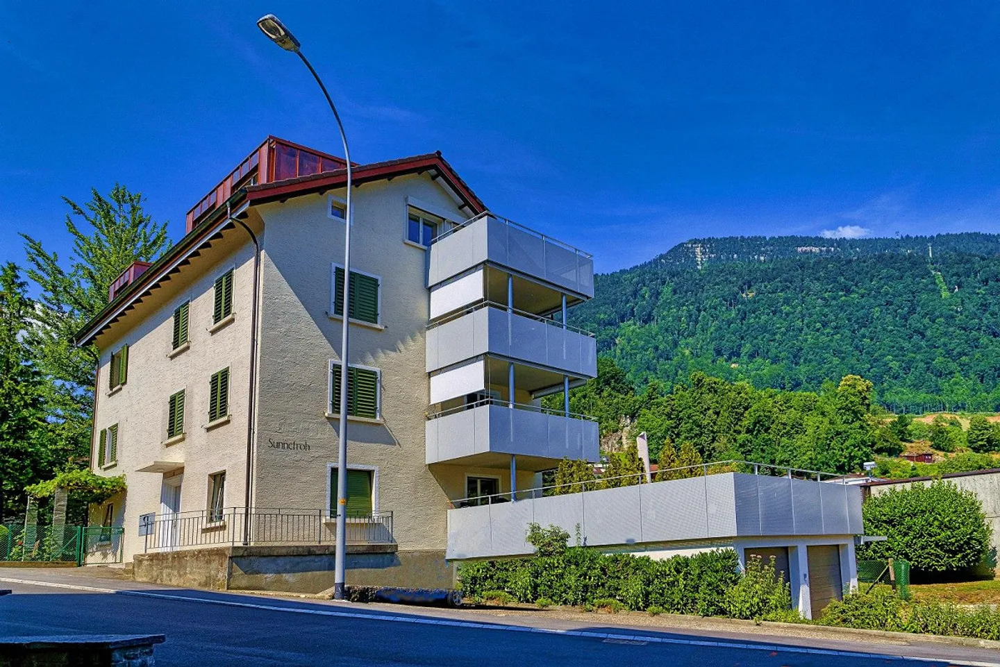 Schöne Dachwohnung in 4-Familienhaus - Foto 13 von 14