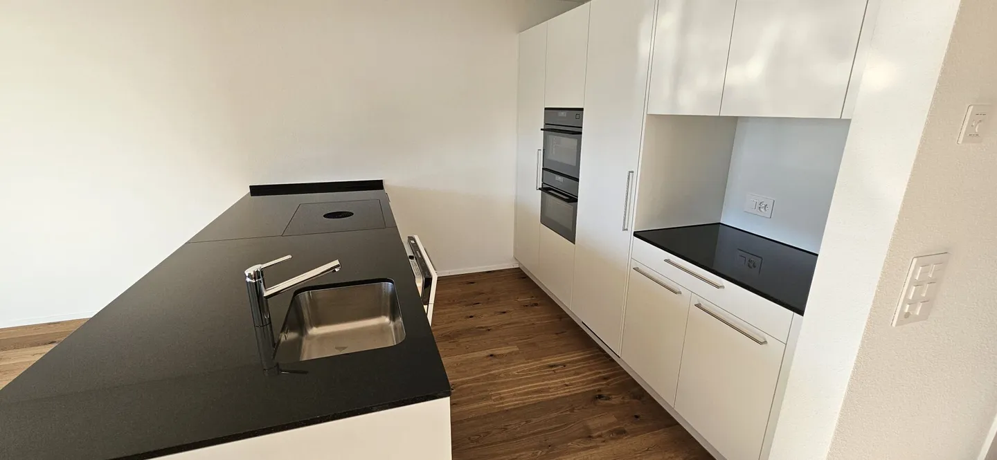 Moderne 4.5-Zimmer-Wohnung mit Loggia - Foto 4 von 14