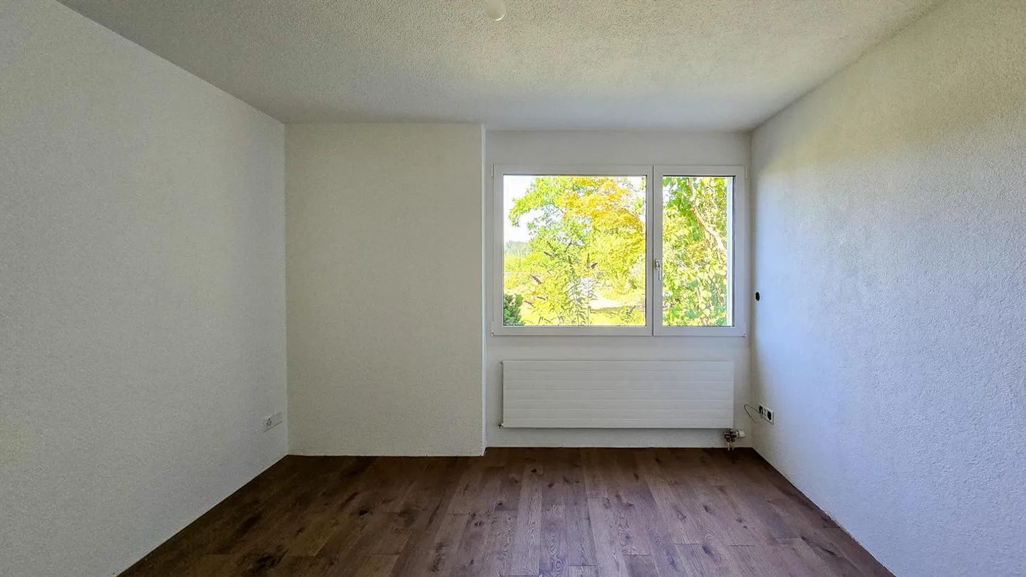 Charmantes Einfamilienhaus mit Garten - Foto 6 von 13
