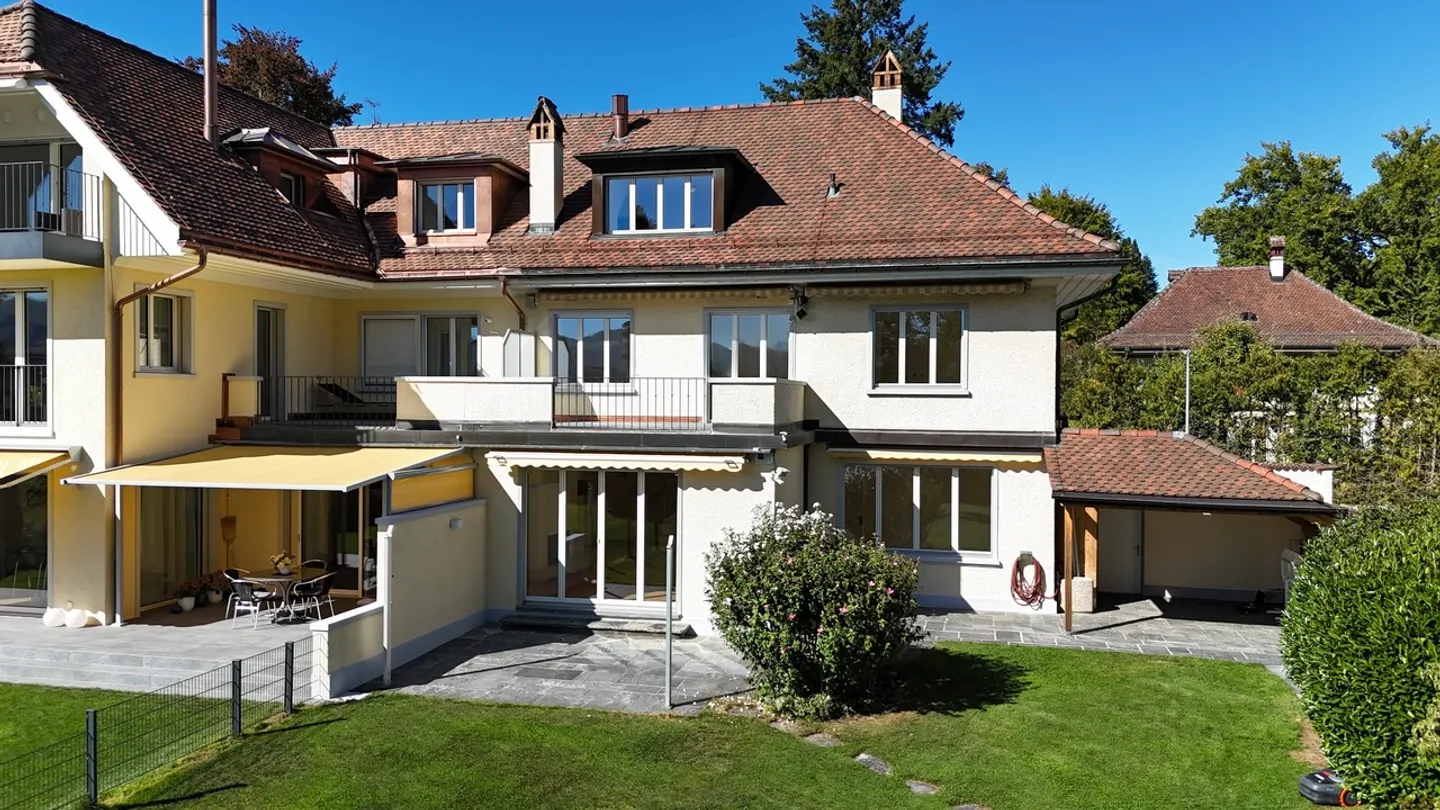 Elegant Duplex Home with Garden - Photo 1 of 13