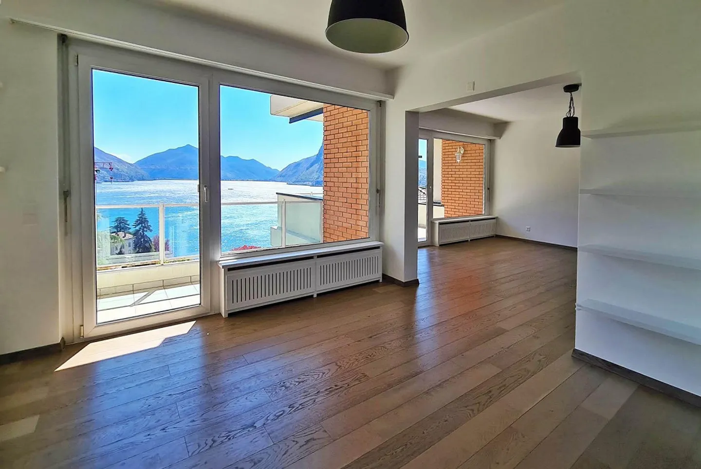 SPACIEUX 3.5 AVEC VUE IMPRENABLE SUR LE LAC À LUGANO CASTAGNOLA - Photo 1 sur 9