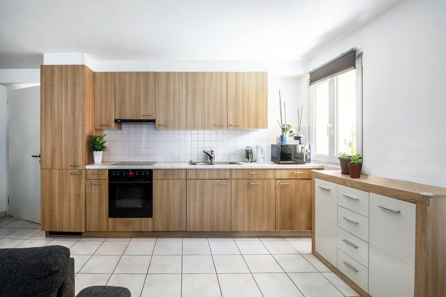 Casa accogliente e ristrutturata con tre appartamenti di 2,5 stanze - Foto 4 di 13