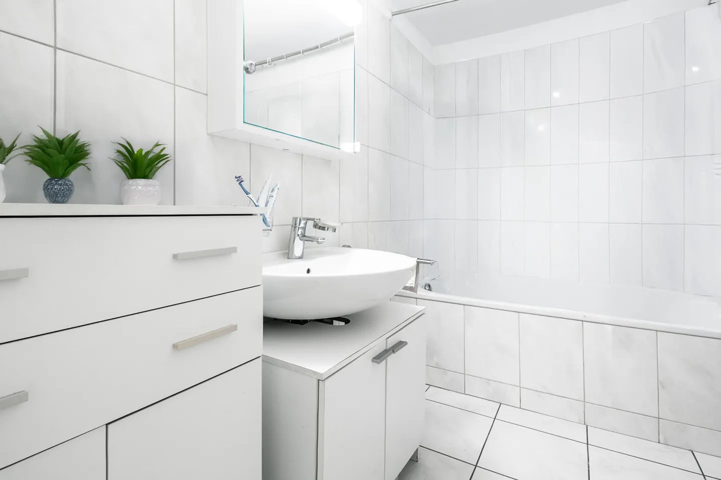 Casa accogliente e ristrutturata con tre appartamenti di 2,5 stanze - Foto 6 di 13