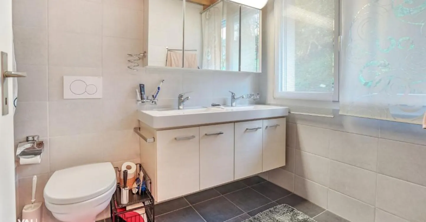 Maison jumelée avec valeur ajoutée : vivre, vivre et louer sous un même toit - Photo 7 sur 12