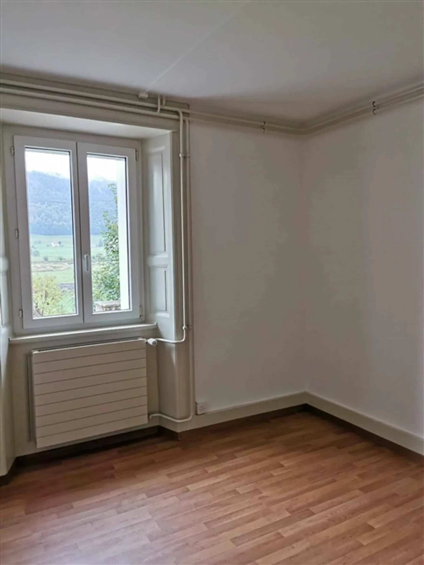 Appartement 3,5 pièces au rez-de-chaussée - Photo 3 sur 3