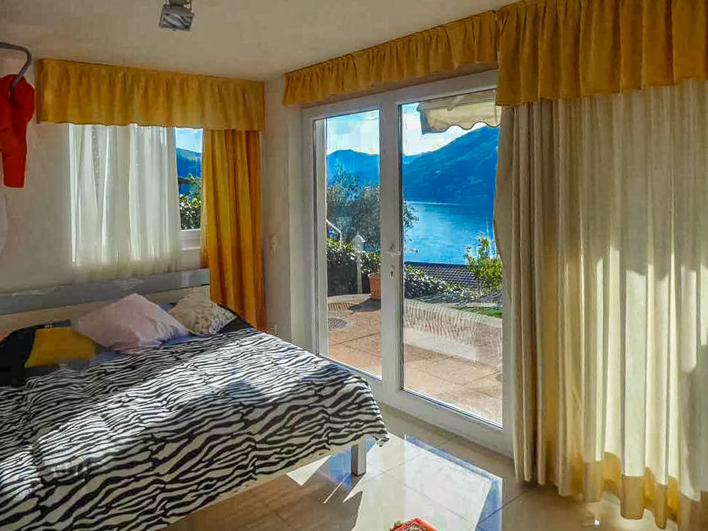 Villa mit herrlichem Seeblick in Bissone - Foto 5 von 9