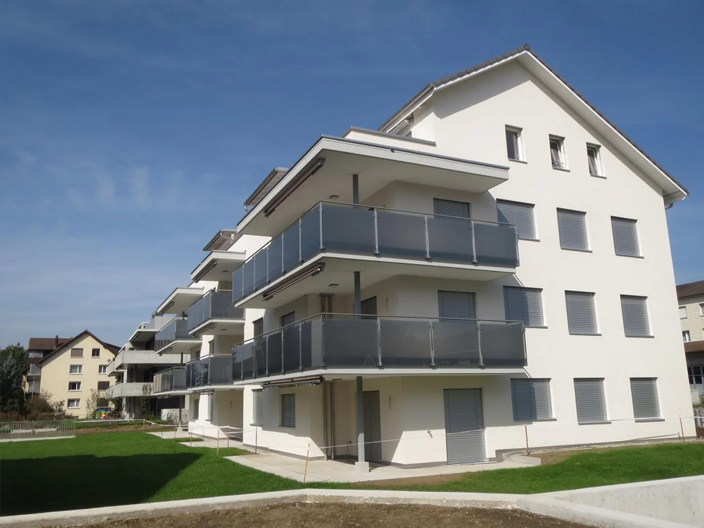Appartement de 3,5 pièces au rez-de-chaussée - Photo 1 sur 14