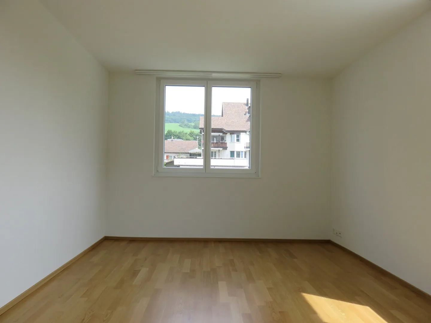 Appartement de 3,5 pièces au rez-de-chaussée - Photo 4 sur 14