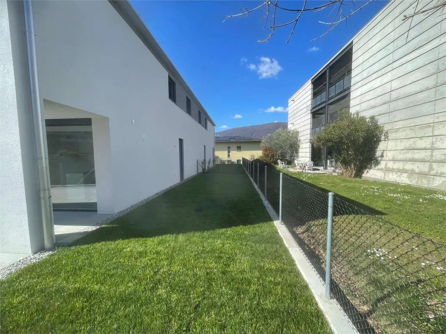 Nuova casa bifamiliare a Cureglia - Foto 4 di 13