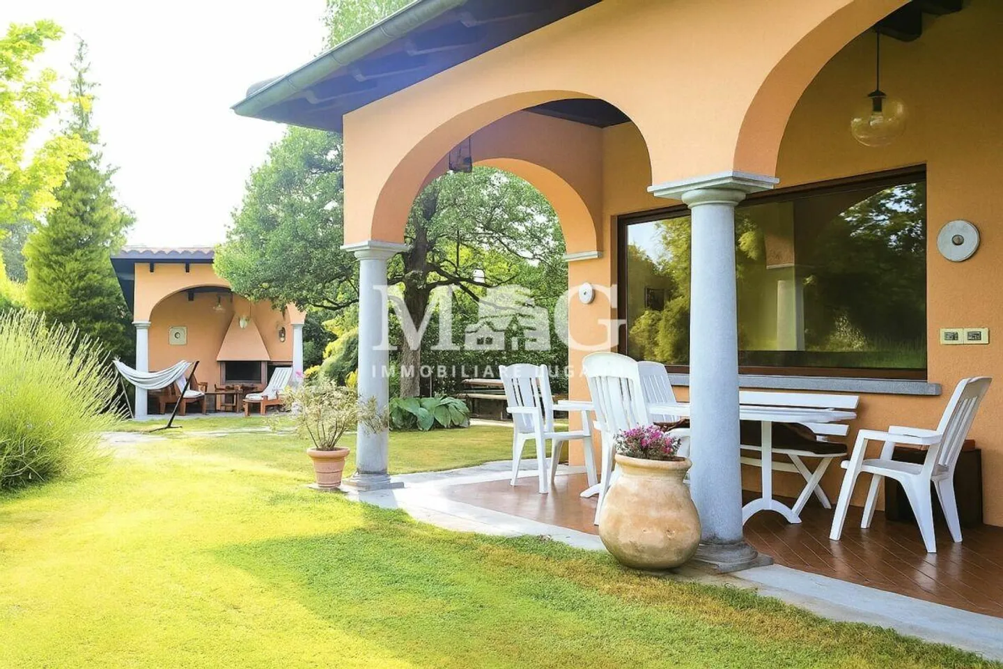 Collina d'Oro: Elegante Villa mit Garten und bebaubarem Land - Foto 4 von 11