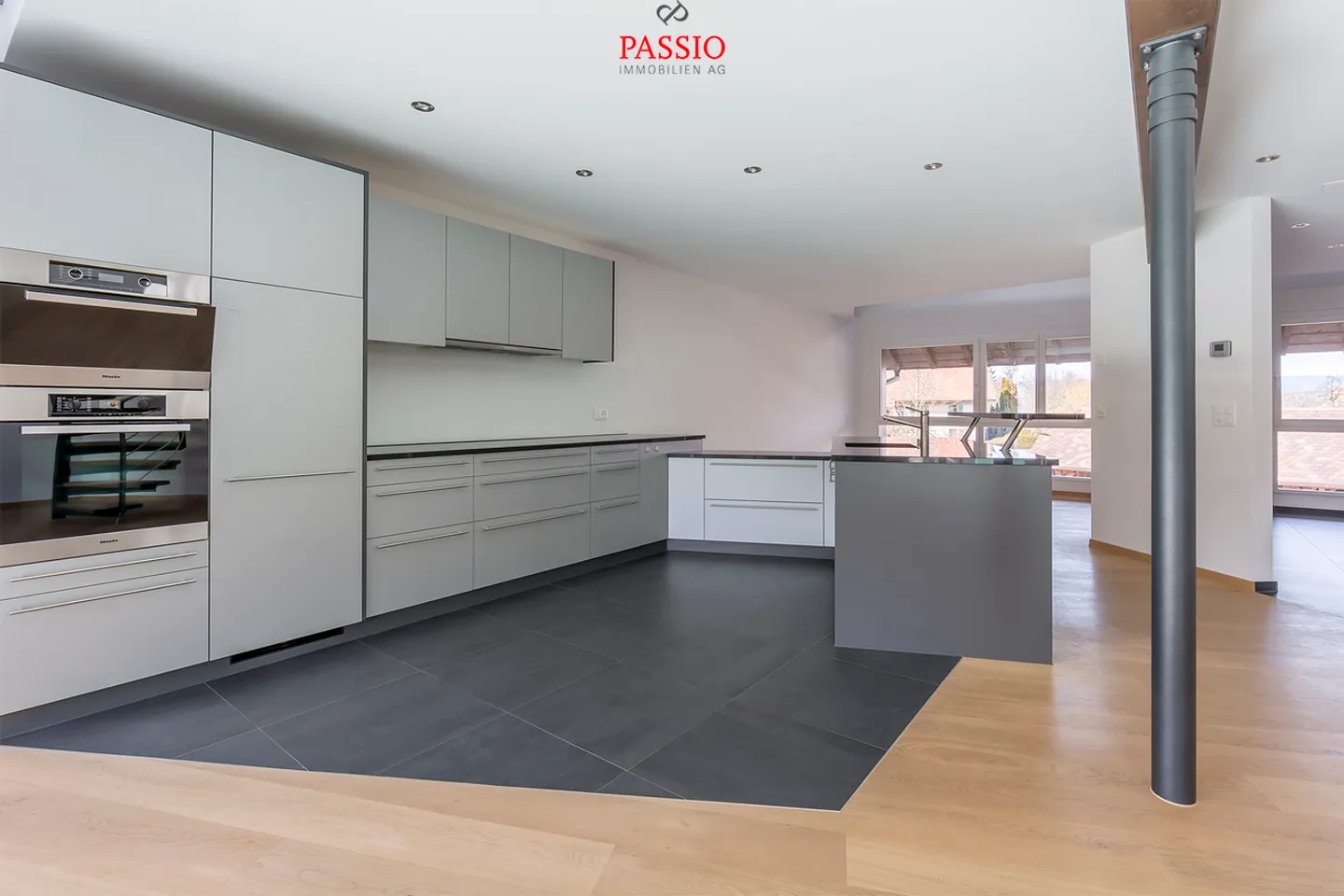 Vie exclusive sur 3 niveaux : Appartement luxueux de 7 pièces dans un emplacement privilégié - Photo 6 sur 21