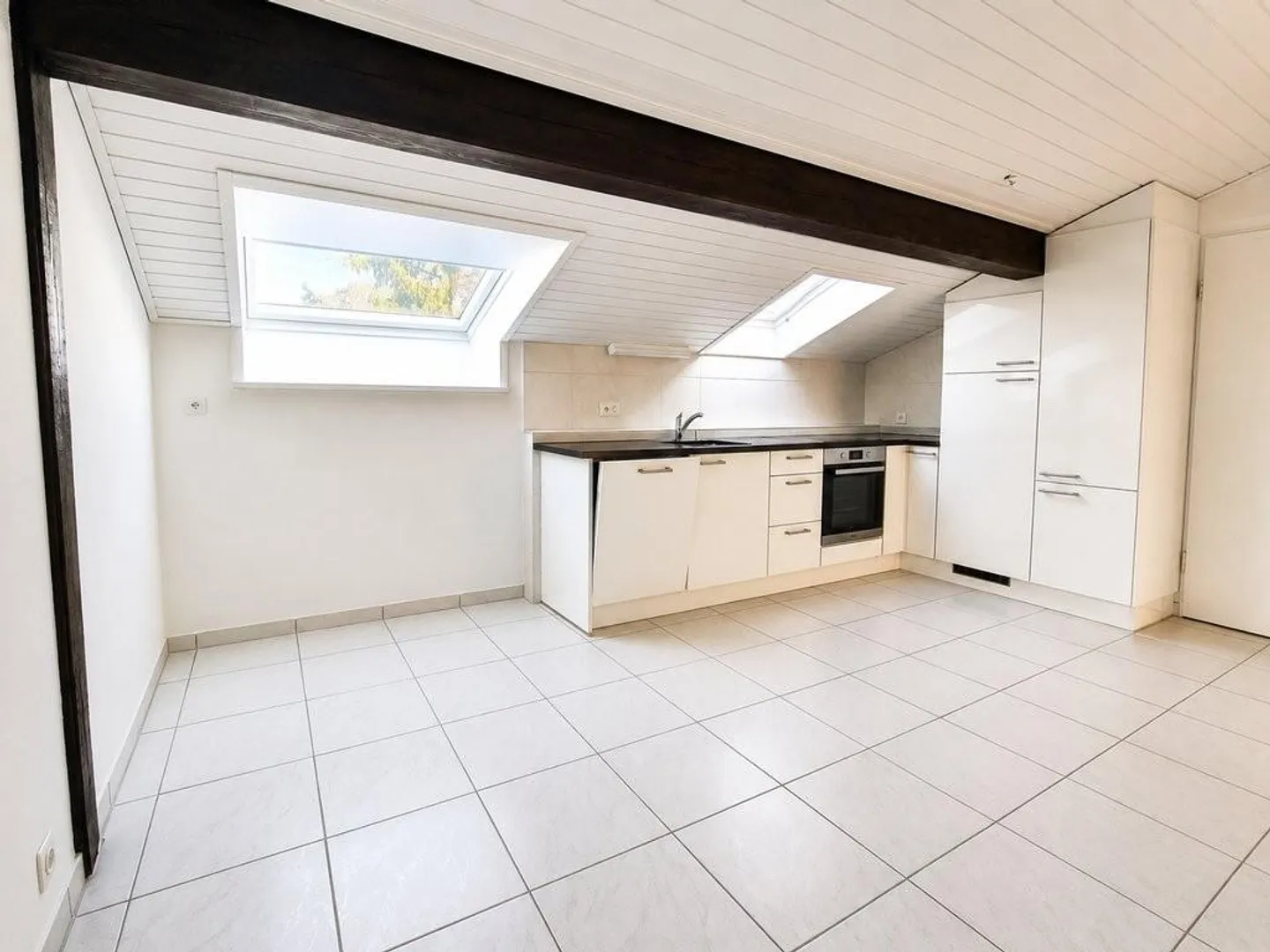 Appartement 3 pièces confortable sous les combles - Photo 1 sur 5