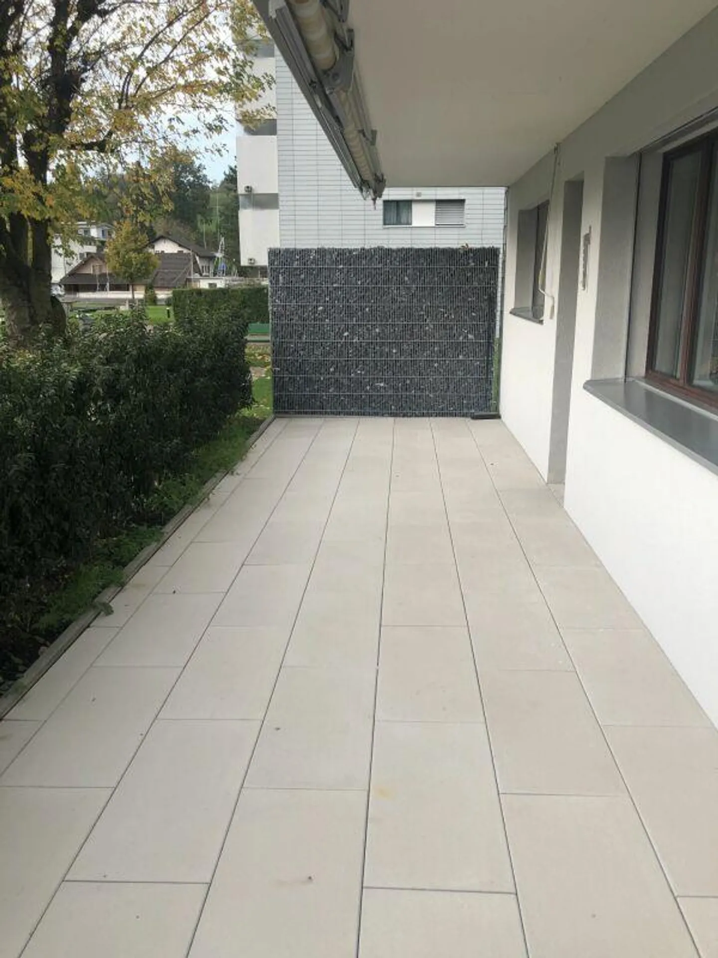 Appartamento di 2.5 locali parzialmente ristrutturato con area salotto in giardino - Foto 7 di 8