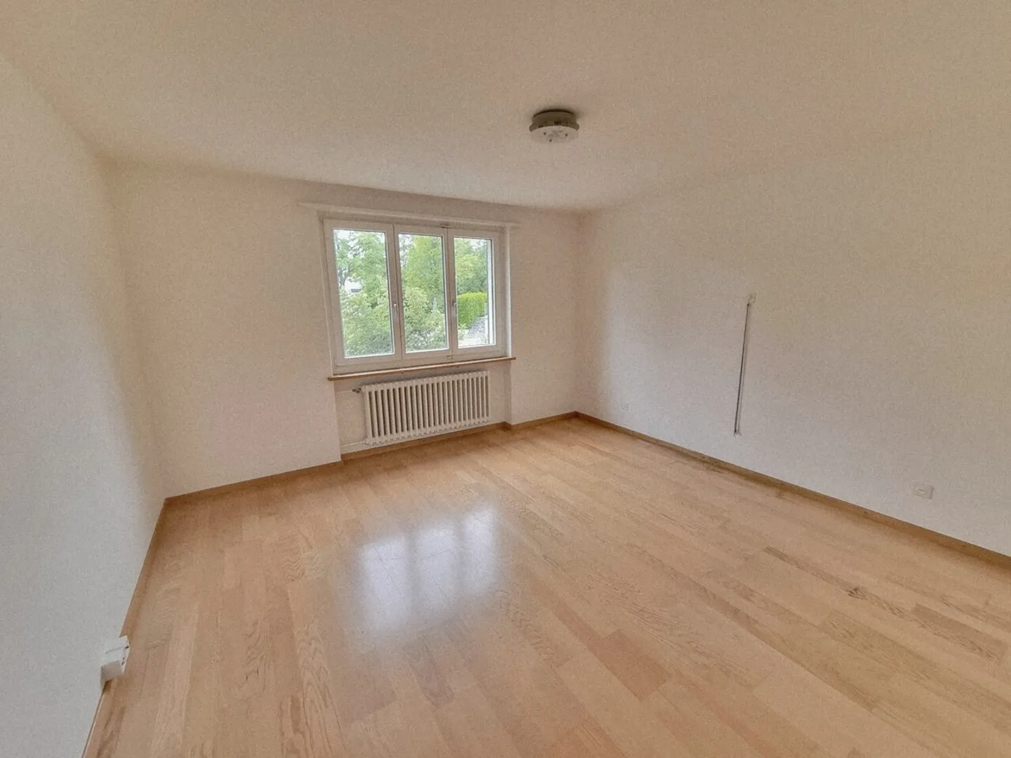 Geräumige Wohnung mit Garten - Foto 8 von 8