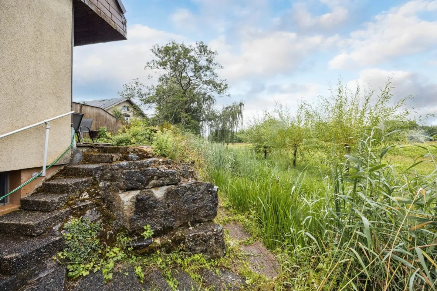 Affascinante casa a schiera angolare in posizione tranquilla a Worben, con vista sul verde - Foto 21 di 22