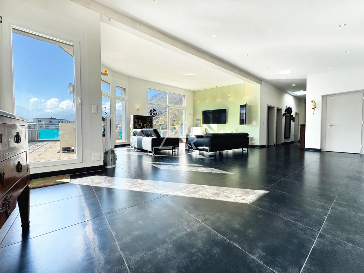 Penthouse avec vue panoramique au cœur de Fully - Photo 1 sur 13