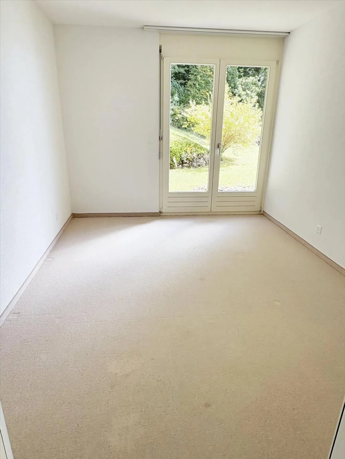 Appartement de 4 pièces en rez-de-jardin avec terrasse - Photo 4 sur 8