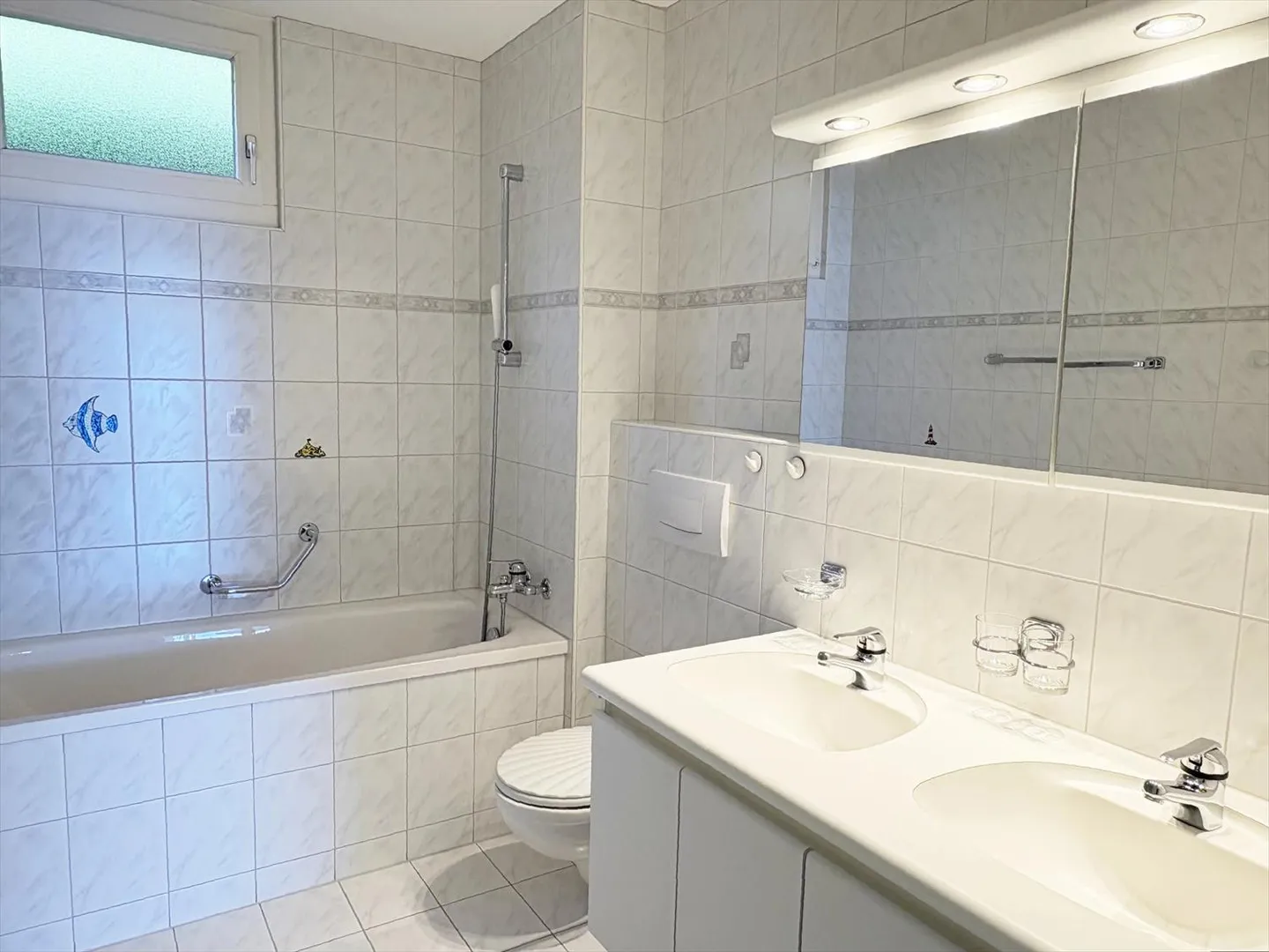 Appartement de 4 pièces en rez-de-jardin avec terrasse - Photo 6 sur 8