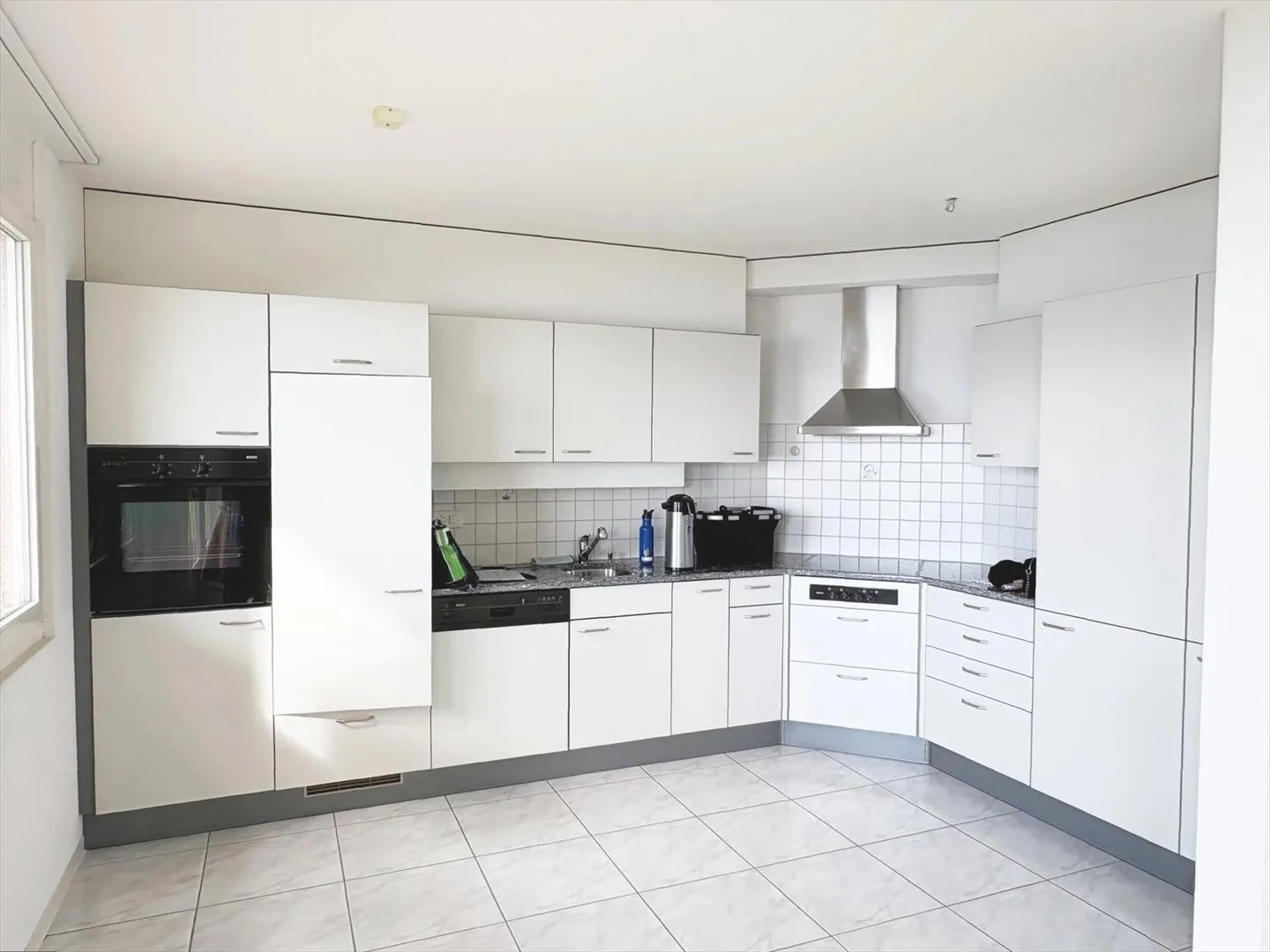 Appartement de 4 pièces en rez-de-jardin avec terrasse - Photo 2 sur 8